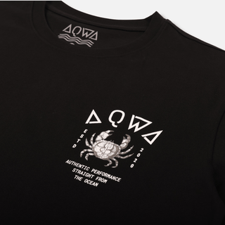 Close-up detail of AQWA crab logo on chest of black tee – designed for those who live for offshore fishing and deep-sea missions.