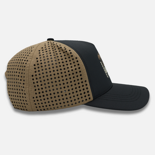 Side view of AQWA snapback hat with brown perforated mesh – breathable design for hiking trails and sunny coastal days.
