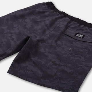AQWA shorts shown from angled front – lightweight camo design with four-way stretch and adjustable waistband.