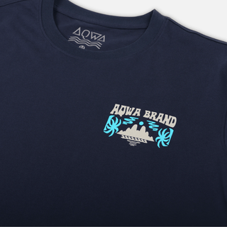 Close-up of AQWA island chest logo – a small reminder that the beach is always calling.