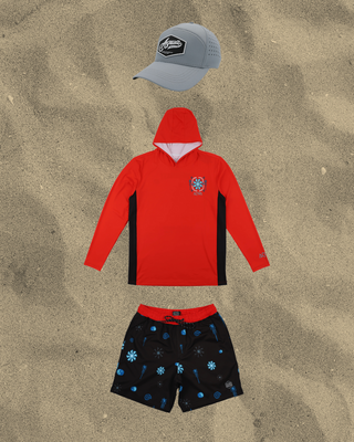 Red AQWA hoodie, black patterned shorts, and a gray cap. Ideal for outdoor activities and bold beach looks with sun protection.