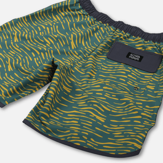 Angled back view of AQWA swim trunks with elastic waistband and quick-drain pocket eyelet.