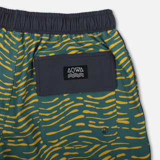 Detailed close-up of AQWA back pocket showing logo, stitching, and drainage eyelet.